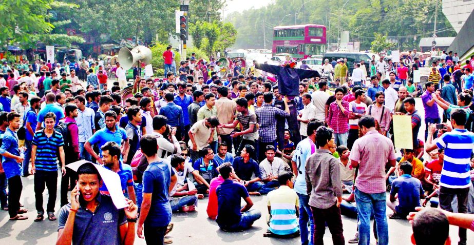 General students under the banner of Hindu student organizations on Friday blocked the Shahbagh inter-section protesting against recent attacks in B'baria and other parts of the country.