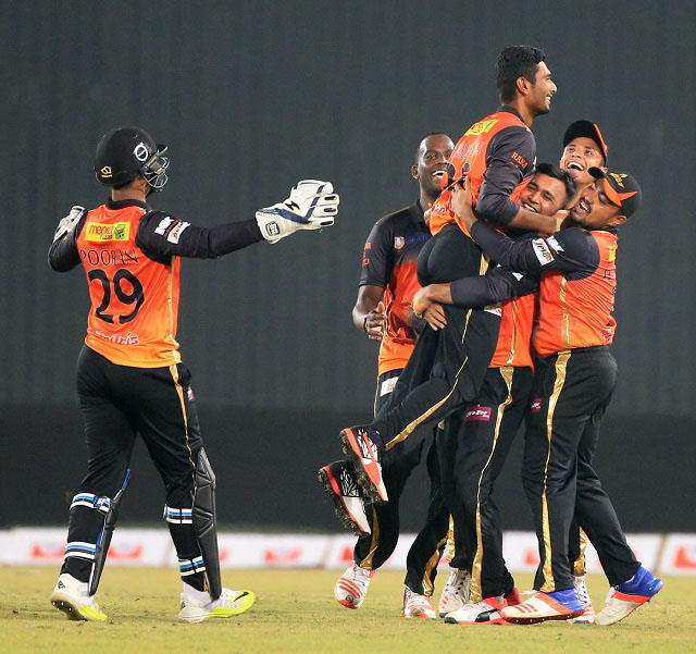 Mahmudullah is mobbed by team-mates after he bowled Khulna to a four-run win against Chittagong Vikings in the AKS Bangladesh Premier League Cricket match at Sher-e-Bangla National Cricket Stadium at Mirpur on Saturday.