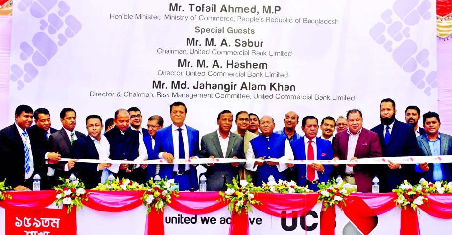 Commerce Minister Tofail Ahmed along with Chairman M A Sabur, Director and Chairman of Risk Management Committee, Md. Jahangir Alam khan and Director M A Hashem of United Commercial Bank Ltd (UCB) inaugurating the 159th UCB Bhola Branch on Sunday. Muhamme