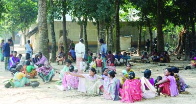 GAIBANDHA: Santal people at Gobindroganj Upazila who were thrown away from their houses are living under open sky . This picture was taken on Sunday.