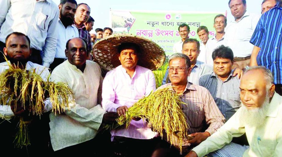 MURADNAGAR (Comilla): Md Raselul Kader, UNO, Muradnagar inaugurating harvesting of Aman paddy to mark the Nabanna Festival on Monday.