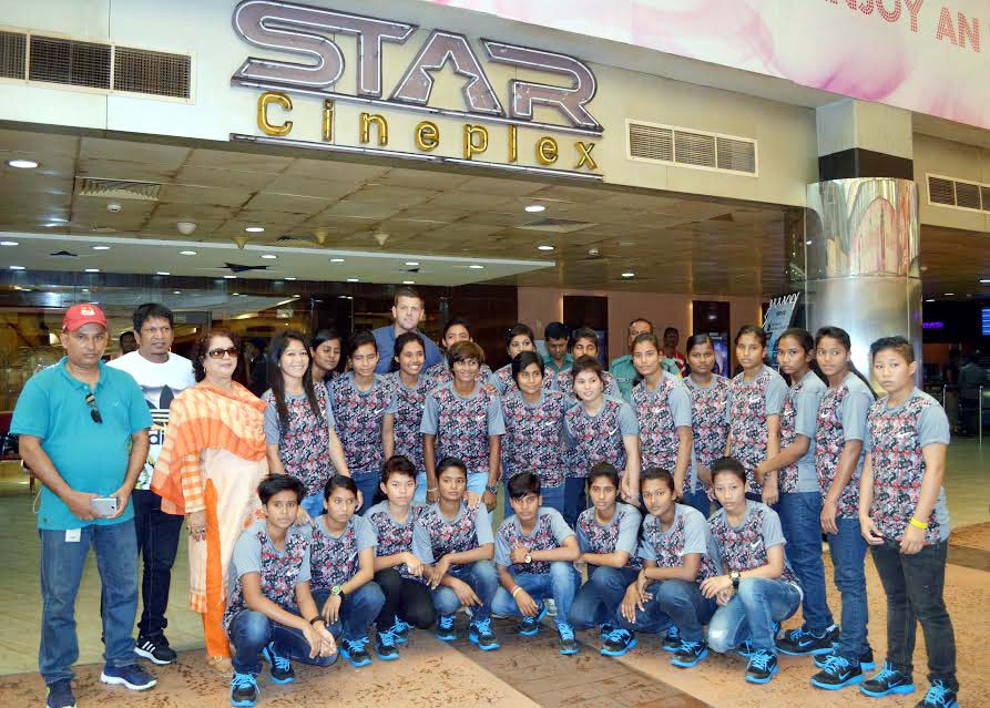 Members of Bangladesh National Under-16 Football team pose for a photo session before enjoying a Bengali movie at the Star Cineplex in the city on Wednesday.