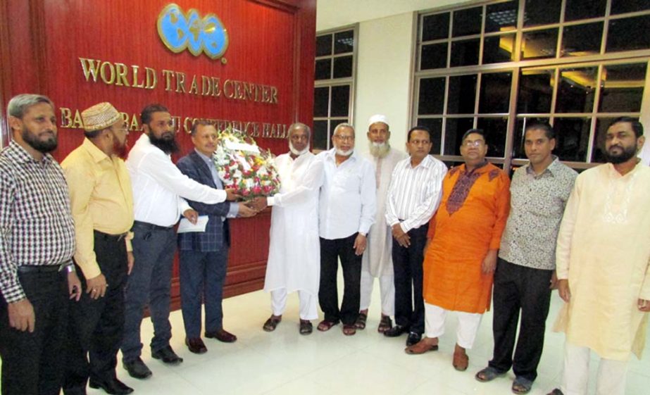 Mahbubul Alam, President, Chittagong Chamber of Commerce and Industry is being greeted by newly elected executive members of Chittagong Aluminum Shilpo Malik Samity at a ceremony in the Port city recently.