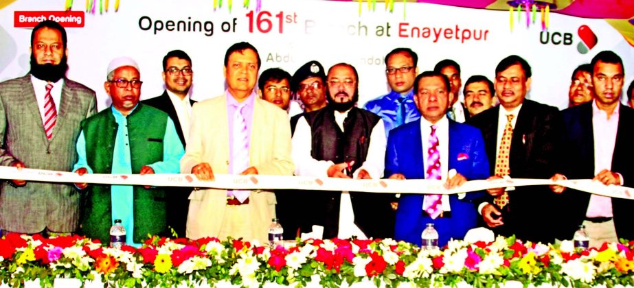 Abdul Majid Mondol, MP and M A Sabur, Chairman of United Commercial Bank Ltd (UCB), Sk. Abdus Salam, Managing Director of Radiance group and Md. Mofizul Islam, Managing Director of M M Knitwear ltd are inaugurating the 161st UCB Enayetpur Branch with the