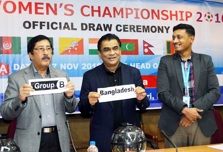 General Secretary of South Asian Football Federation (SAFF) Anwarul Huq Helal (left) and President of SAFF and President of Bangladesh Football Federation (BFF) Kazi Salahuddin showing the groupâ€™s name and teamâ€™s name during the draw ceremon