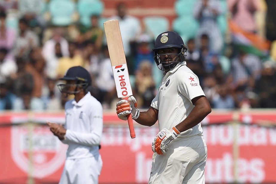 R Ashwin raises his bat after reaching his eighth Test fifty on the 2nd day of the 2nd Test between India and England at Vishakapatnam on Friday.