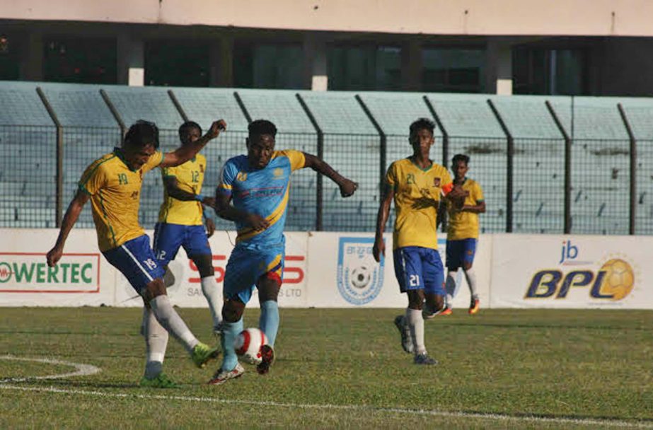 An action from the match of the JB Group Bangladesh Premier League Football between Sheikh Jamal Dhanmondi Club Limited and Chittagong Abahani Limited at the MA Aziz Stadium in Chittagong on Friday.