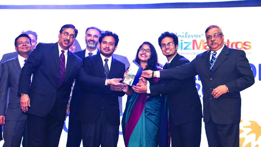 The winners of Unilever BizMaestros 2016 are receiving trophy from the judges recently. Unilever Bangladesh arranged the programme in Hotel Radisson in the city.