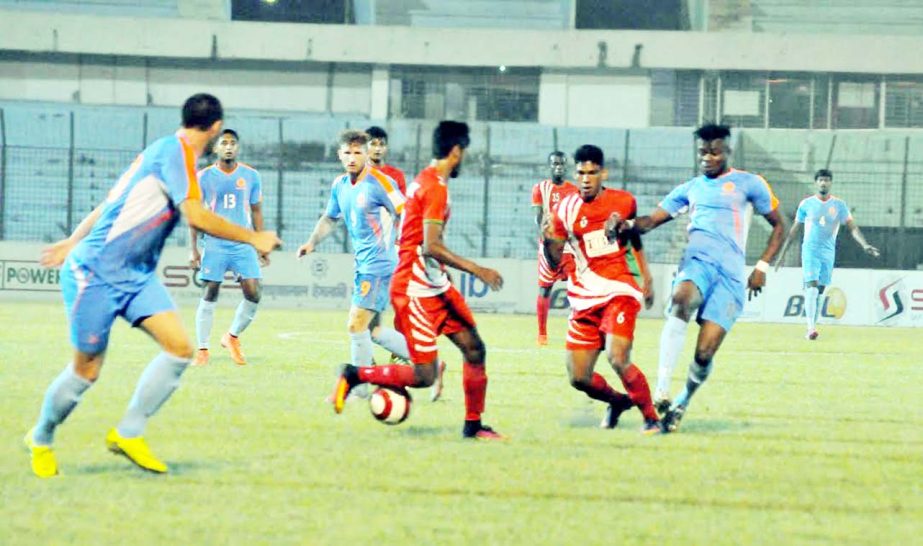 An action from the JB Bangladesh Premier League Football match between Dhaka Abahani Limited and Muktijoddha Sangsad KC at the MA Aziz Stadium in Chittagong on Saturday.