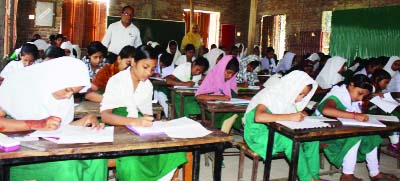 COMILLA: Students at a PSC examination centre at Model Primary School in Muradnagar Upazila on Sunday.