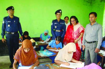 RAJBARI: Salma Begum PPM, SP Rajbari with high police officials visiting a PSC examination centre at Rajbari on Sunday.