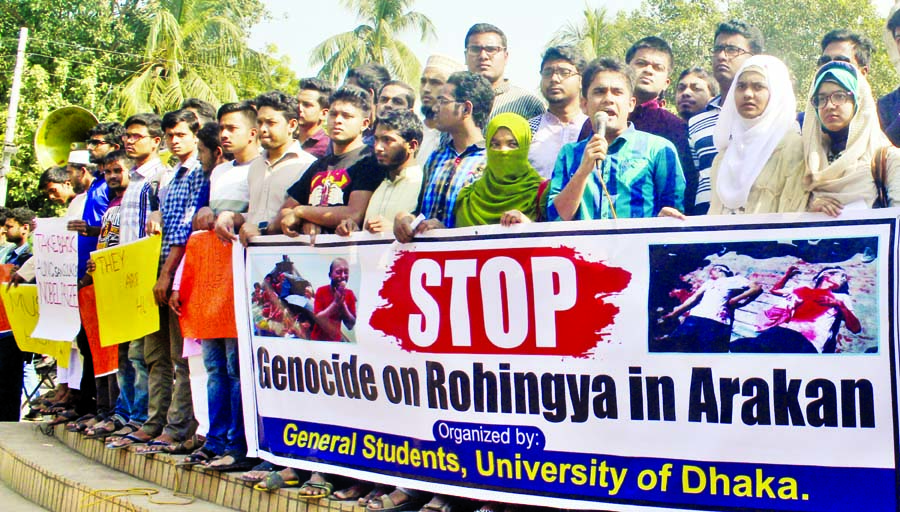 General students of Dhaka University organised a rally in front of Raju Sculpture of the university on Monday with a call to stop genocide on Rohingya in Arakan.