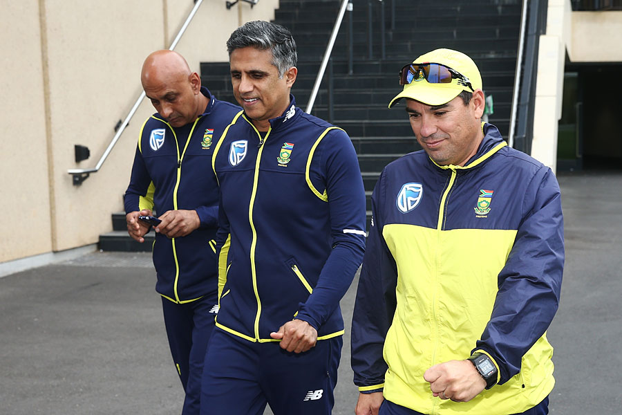 Russell Domingo (right) flanked by the South Africa team manager and security official at Adelaide on Tuesday.