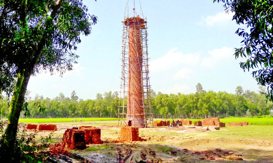 Defying the government order an influential quarter constructing brick-field on farmland at Haripur village of Gopalganj Upazila in Dinajpur district. This photo was taken on Tuesday.