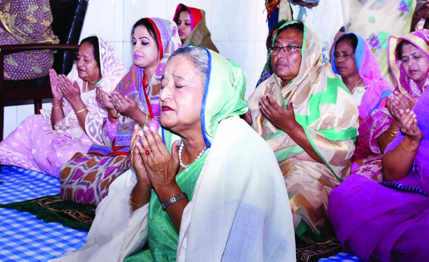 Prime Minister Sheikh Hasina offering munajat after the ziarat of Mazar of Hazrat Shahjalal (RA) in Sylhet yesterday.
