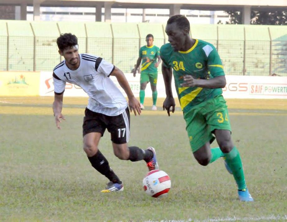 A moment of the match of the JB Group Bangladesh Premier League Football between Arambagh Krira Sangha and Rahmatganj MFS at the MA Aziz Stadium in Chittagong on Thursday.