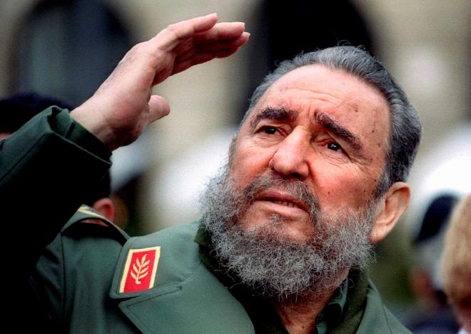 Cuba's President Fidel Castro gestures during a tour of Paris in this March 15, 1995 file photo. REUTERSCharles PlatiauFiles