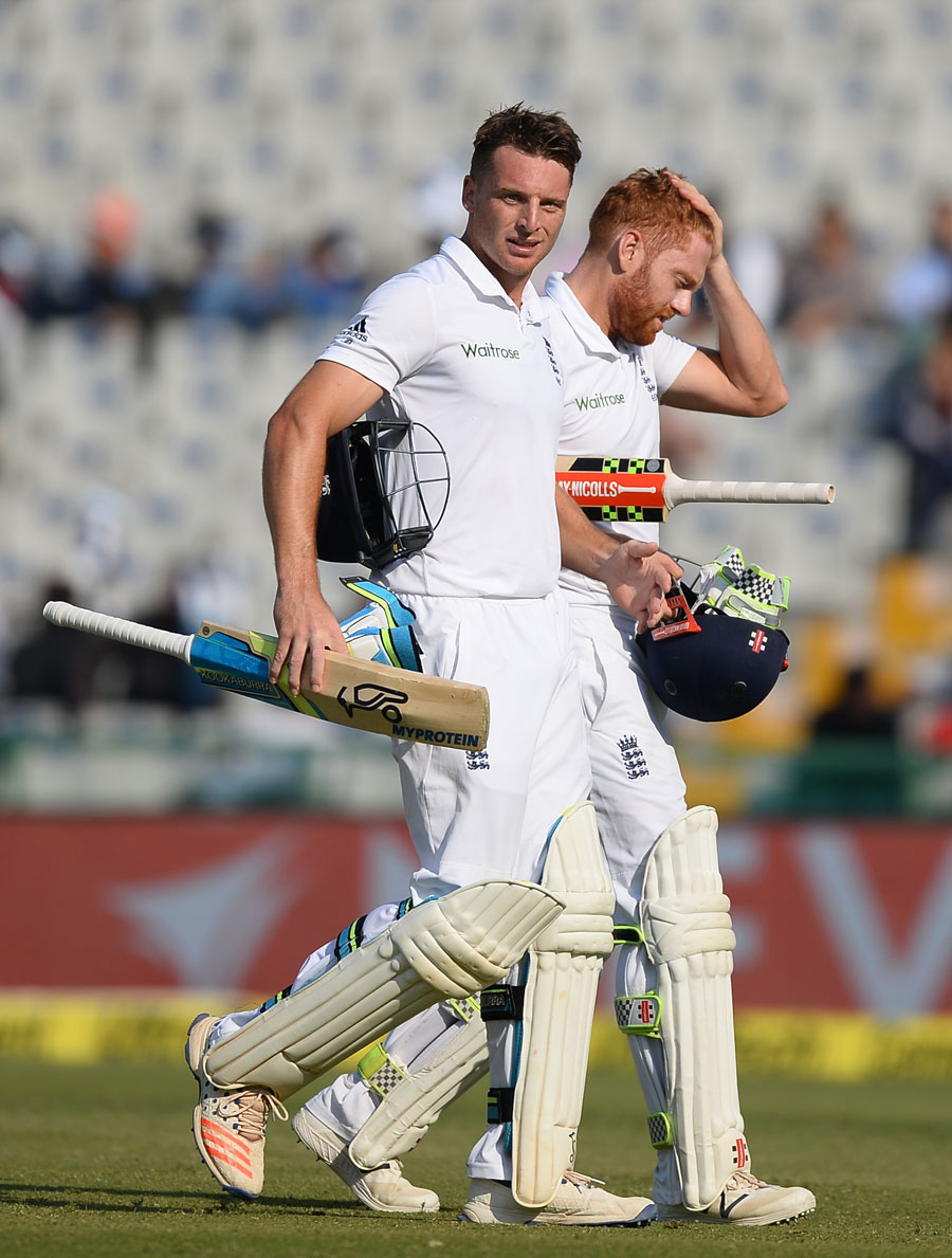 Jos Buttler and Jonny Bairstow steadied England with a partnership until tea on the 1st day of 3rd Test between India and England at Mohali on Saturday.