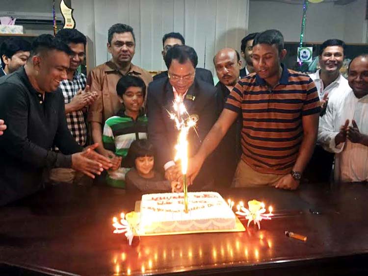 President of Sheikh Russel Memorial Sporting Club Lion Md Mojibur Rahman Hawlader celebrates the first founding anniversary of the Club by cutting a cake in the city recently. Sheikh Russel Memorial Sporting Club is the defending champions of the Premier