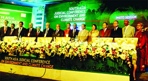 Speaker Dr. Shirin Sharmin Chaudhury, Law Minister Anisul Huq, Chief Justice Surendra Kumar Sinha, among others Foreign Chief Justices seen at the photo session at the closing ceremony of the two-day South Asia Judicial Conference on Environment and Clima