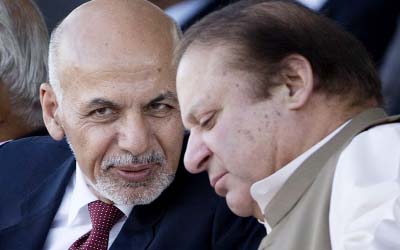 Afghan President Ashraf Ghani (left) talks with Pakistani Prime Minister Nawaz Sharif in Islamabad, Pakistan.