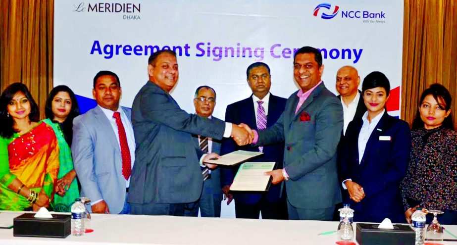 Khaled Afzal Rahim, Head of Cards of NCC Bank Limited and Ashwani Nayar, General Manager of Le MÃ©ridien Dhaka signed agreement in the city recently. Under this deal the Bank's Premium Cardholders will get special discount and buffet offer at the resta