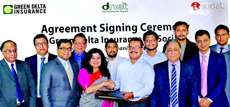 Farzana Chowdhury, CEO of Green Delta Insurance Company and Dr Ananya Raihan, CEO of iSocial (a social enterprise for bridging marginalized community) exchanging a signing documents of Kallyani Project in the city recently. Nasir A Choudhury, Advisor and