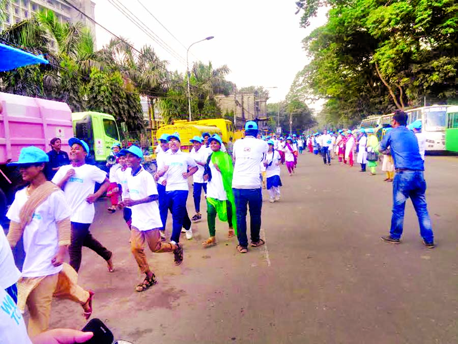 A race competition organised by different organisations including Concerned for Family Development and Sajeda Foundation was held in front of the Nagar Bhaban on Sunday demanding toilets.