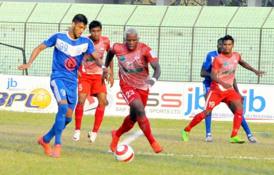 An action from the match of the JB Group Bangladesh Premier League Football between Soccer Club Feni and Uttar Baridhara Club at the MA Aziz Stadium in Chittagong on Sunday.