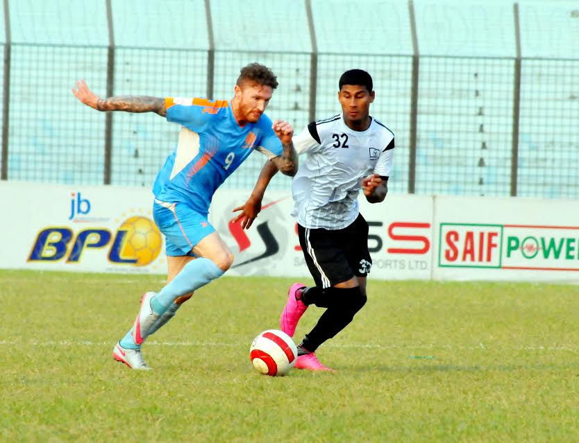 A moment of the JB Bangladesh Premier League football match between Abahani Limited and Arambagh Krira Sangha at the MA Aziz Stadium in Chittagong on Monday.