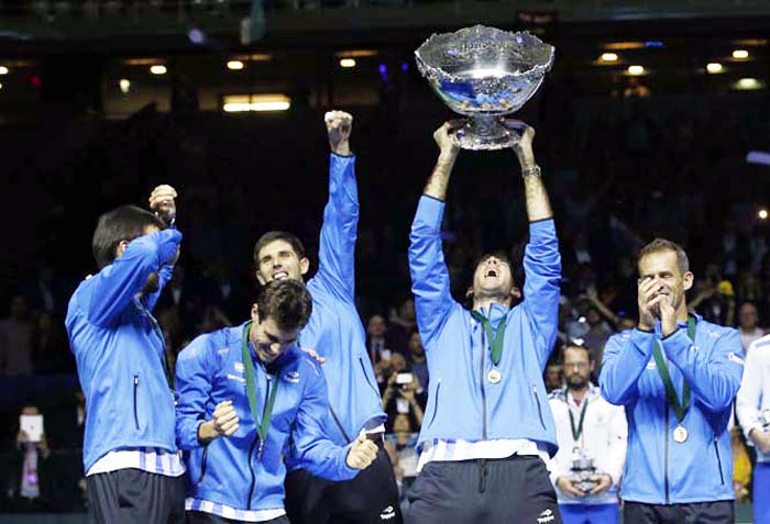 Argentina's Juan Martin Del Potro lifts the trophy after winning the Davis Cup final in Zagreb, Croatia on Sunday. Argentina defeated Croatia 3-2 in the Davis Cup final.