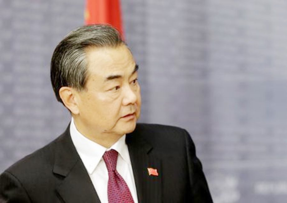 Chinese Foreign Minister Wang Yi on on Tuesday holds talks with a visiting Myanmar delegation (not seen) in Beijing.