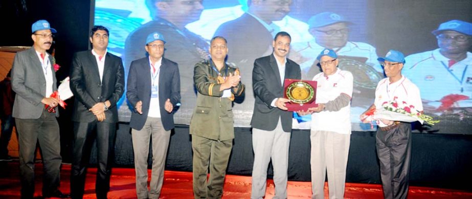 CCC Mayor A J M Nasir Uddin handing over crests among the former chief engineers of CCC at a seminar on 'road construction and quality control' at Engineersâ€™ Institute Auditorium organised by CCC Engineer Department on Tuesday.