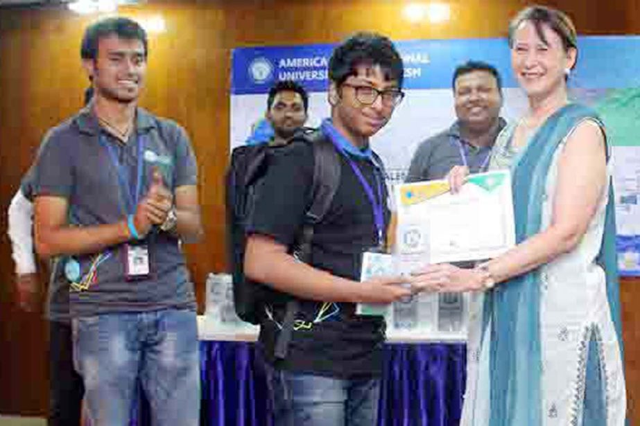 Dr Carmen Z Lamagna, Vice-Chancellor of American International University-Bangladesh handing over the crests and certificates to the winners of "AIUB CS Fest 2016" held at the University campus recently.