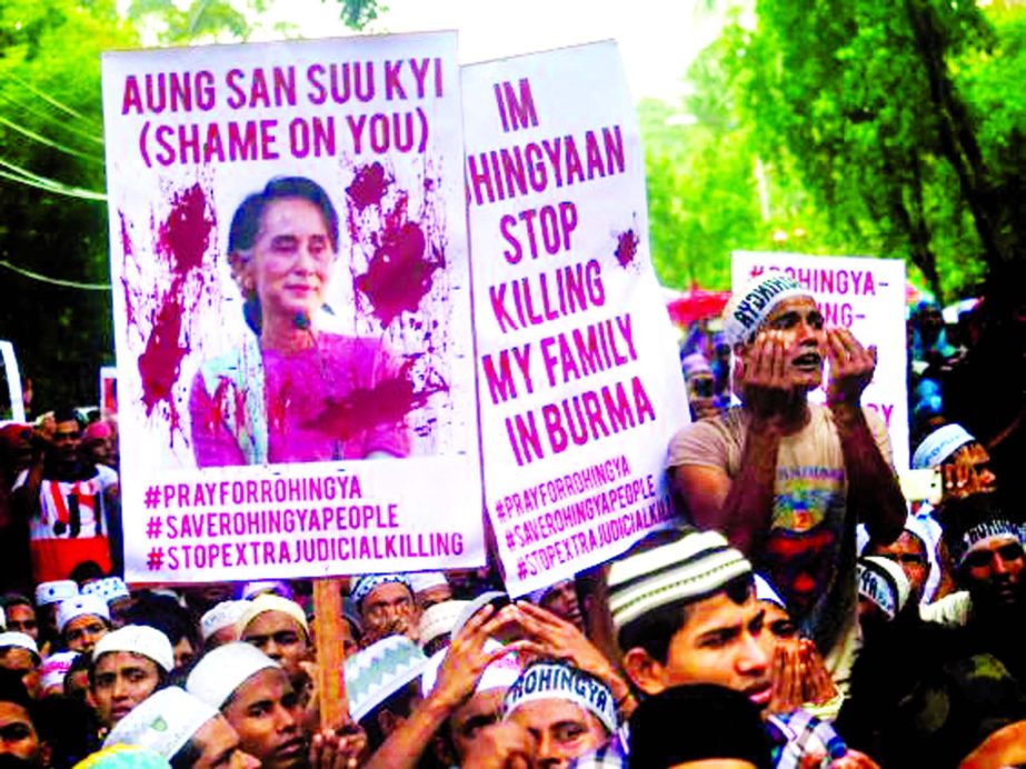 Rohingya Muslims demonstrate outside the Burmese embassy in Kuala Lumpur