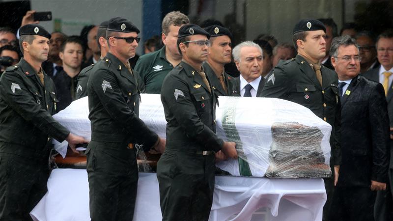 President Michel Temer receives the coffin of a Chapecoense player who died in the plane crash in Colombia.