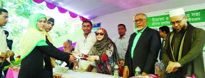 MOULVIBAZAR: Marina Yasmin Chowdhury, Vice Chairman, East Coat Group distributing cheque and blankets among poor women organised by Centre for Zakat Management at Kadipur Union as Chief Guest on Saturday.