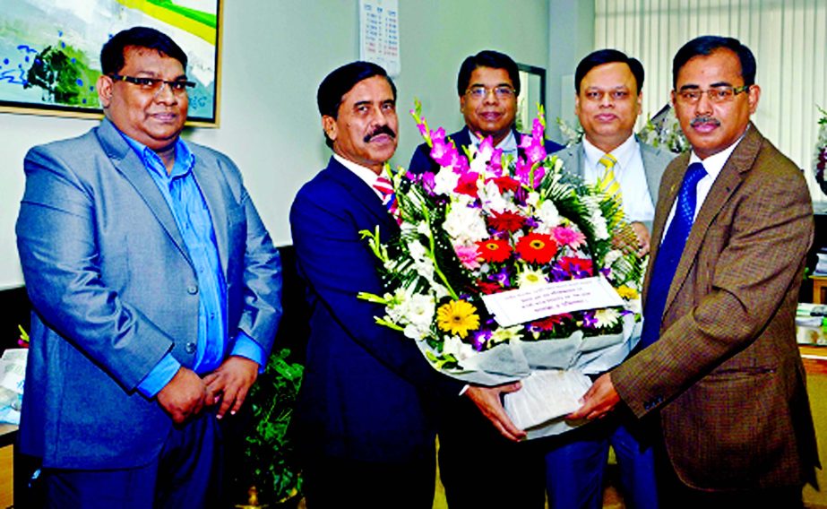 Md Ataur Rahman Prodhan, Managing Director and CEO of Rupali Bank Limited (RBL) greeting the newly appointed Deputy Governor of Bangladesh Bank, SM Moniruzzaman on behalf of the bank. Debasish Chakrabarty,Deputy Managing Director, Bishnu Pada Choudhury,