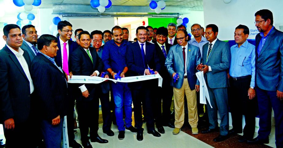 Abrar A Anwar, Chief Executive Officer and Apurva Jain, Head of Transaction Banking from Standard Chartered Bangladesh pose after inaugurating a Business Development Office for Karnaphuli Export Processing Zone in Chittagong recently. Senior officials of