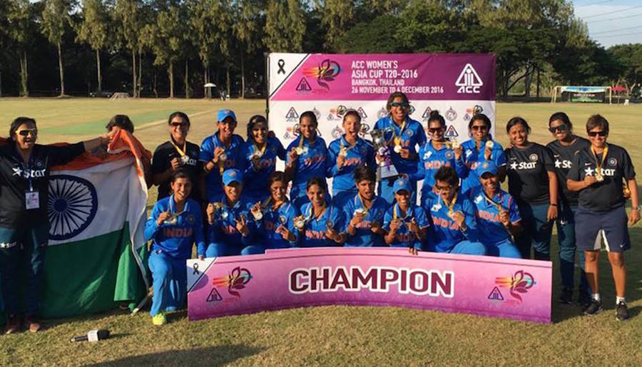 The victorious Indian team with the Asia Cup trophy after beating Pakistan by 17 runs in Women's T20 Asia Cup final in Bangkok on Sunday.