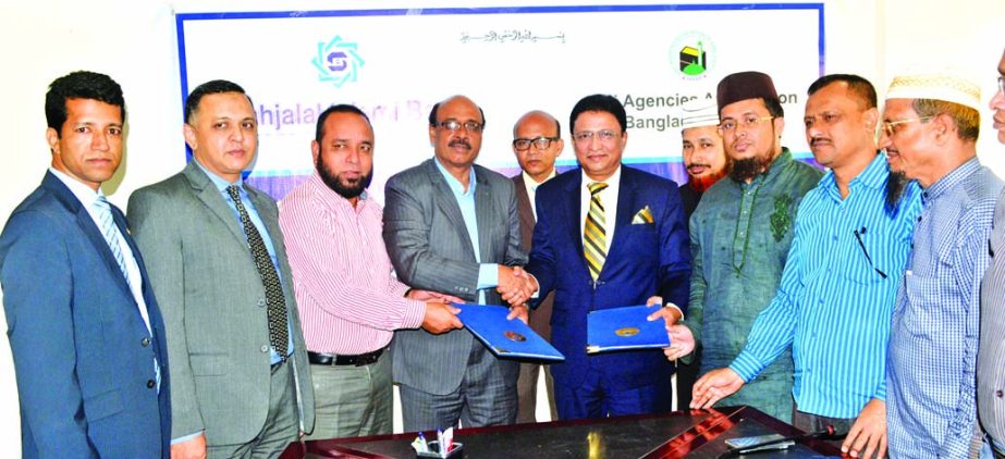 A Memorandum of Understanding (MOU) signed between Shahjalal Islami Bank Limited (SJIBL) and Hajj Agencies Association of Bangladesh (HAAB) recently in the city. Under the MoU all Veloty & Non-veloty Hajj & Umrah Pilgrims can deposit their Hajj & Umrah Pr
