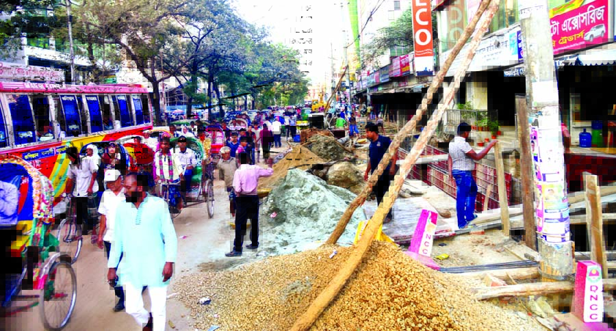 Dhaka stuck in traffic jams as road cutting is being undertaken in most of the areas causing sufferings to commuters and dwellers. This photo was taken from Bijoynagar area on Wednesday.