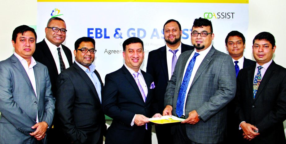 M Nazeem A Choudhury, Head of Consumer Banking of Eastern Bank Limited and Syed Moinudin Ahmed, Managing Director, GD Assist Ltd (a medical tourism company) exchanging documents after signed a MoU in the city recently. Wafi SM Khan, Deputy Managing Direc