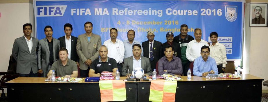 The participants of the concluding ceremony of the FIFA MA Refereeing Course with the instructors and officials of Bangladesh Football Federation (BFF) pose for a photograph at the BFF House on Thursday.
