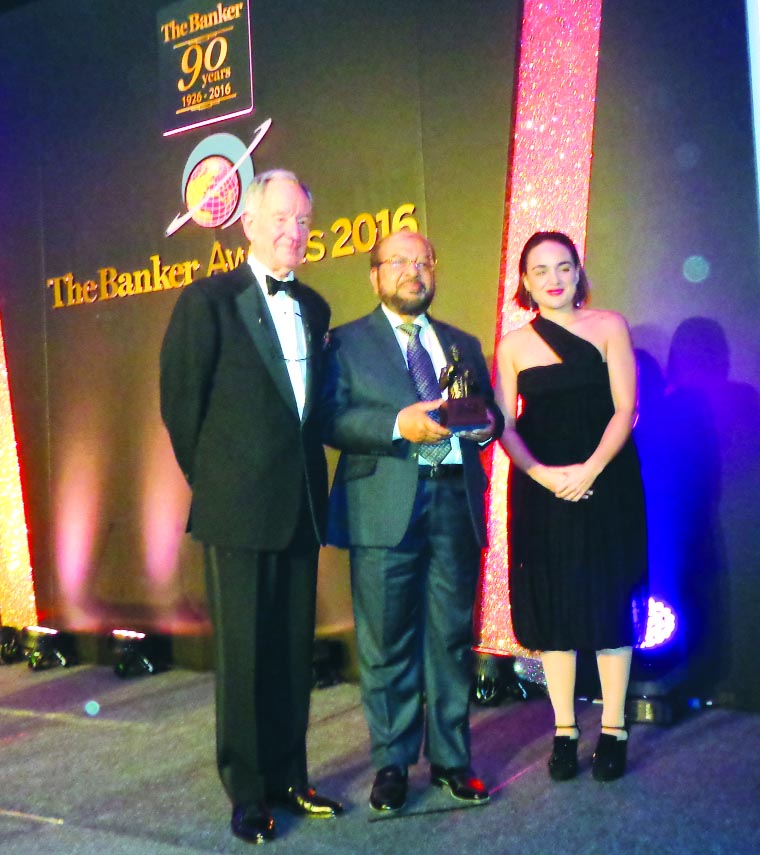Mohammad Abdul Mannan, Managing Director and CEO of Islami Bank Bangladesh Limited receiving the 'Bank of the Year Award 2016' from Brian Caplen, Editor of 'The Banker' at Hilton in London UK recently. More than 400 dignitaries attended the award givi