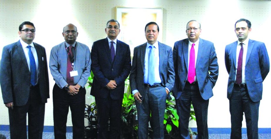 Muhammed Ali, Managing Director of UCB and Golam Hafiz Ahmed, Managing Director of NCC Bank poses a photo session after signed an agreement for distribution of inward foreign remittance of Placid Express USA through the countrywide network at the banks Co