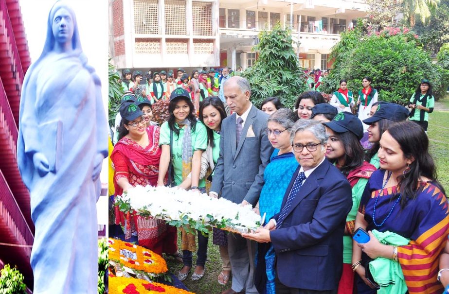 Dhaka University Vice-Chancellor Prof Dr AAMS Arefin Siddique placing floral tributes at the portrait of Begum Rokeya in front of Rokeya Hall of the university on Friday marking Rokeya Day.