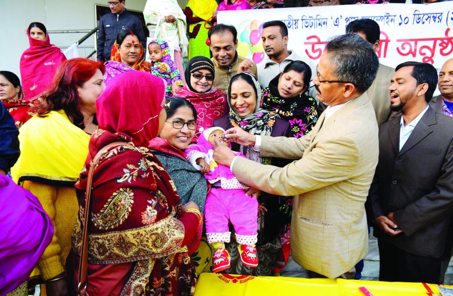 RAJSHAHI: Acting Mayor of Rajshahi City Corporation Nizamul Azim launching Vitamin A Plus Campaign through administering capsule to a baby in City Bhaban premises yesterday.