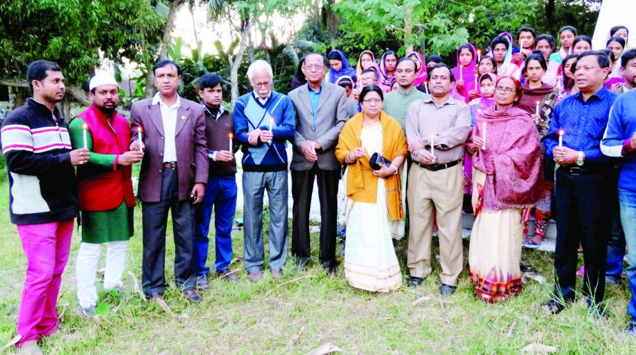 KISHOREGANJ: Gourober Prantor, a social and cultural organisation arranged a candle light programme to observe the Rokeya Day at the Shaheed Minar of Government Mohila College on Friday.