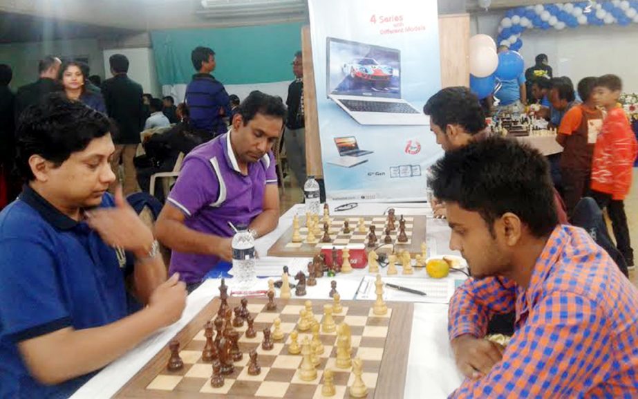 A scene from the fifth round match of the Walton Premier Division Chess League between SAIF Sporting Club (left) and Sultana Kamal Smrity Pathagar at the Auditorium of National Sports Council Tower on Saturday.